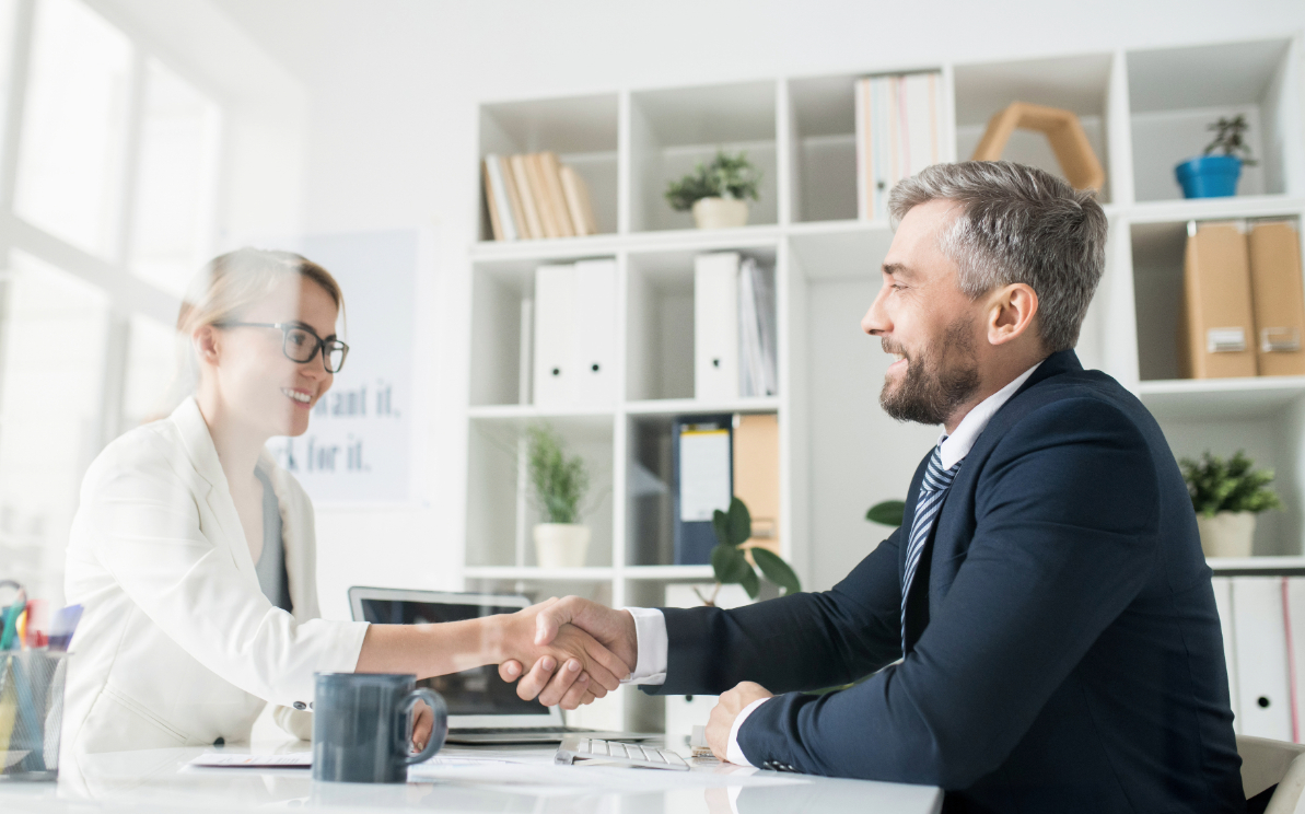 Business owner talking to investment banker